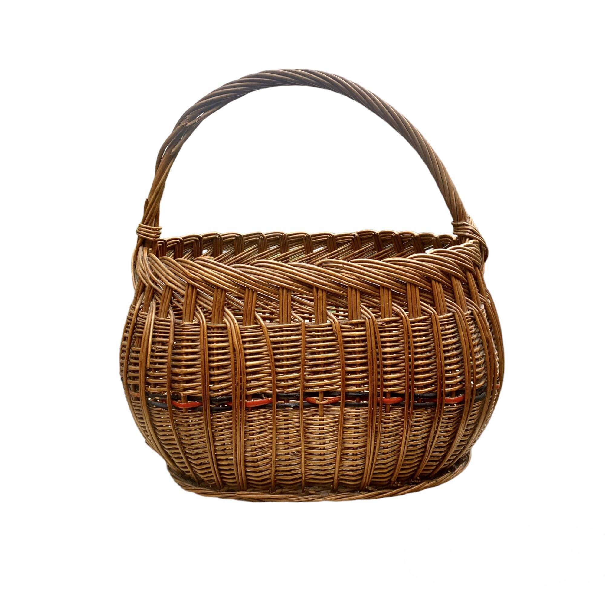 Old woven wicker basket and scoubidou