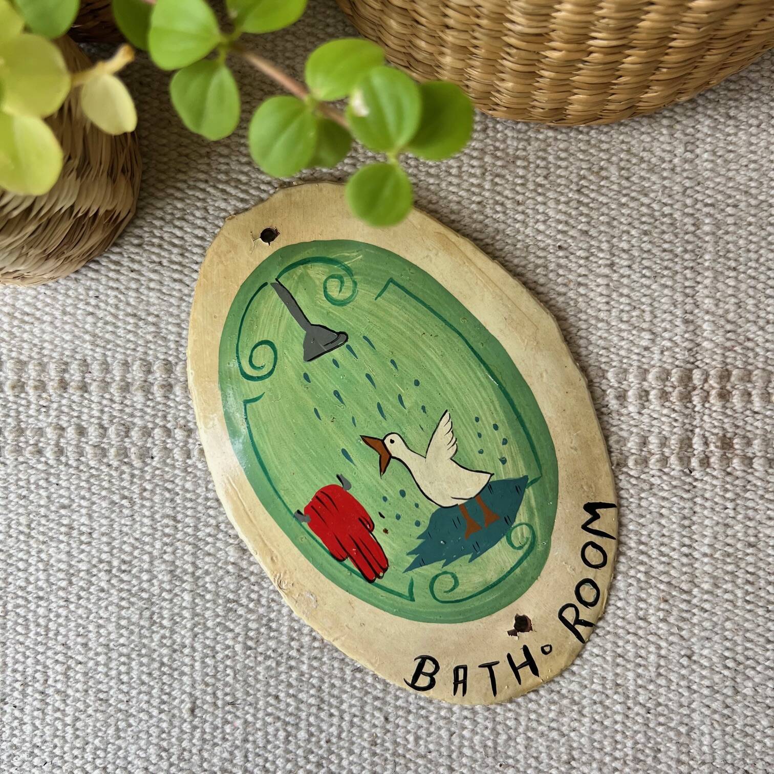 Old enameled plaque “Bathroom”