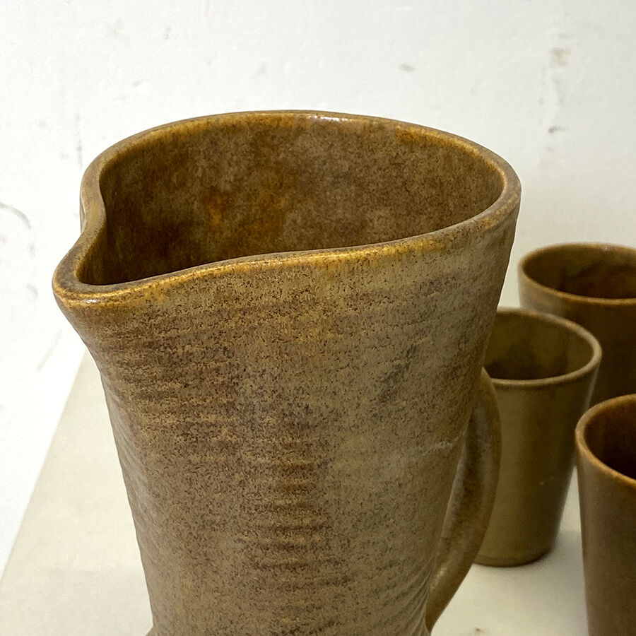 Set in stoneware carafe and 9 glasses