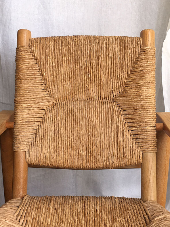 "Paillé" armchair by Charlotte Perriand