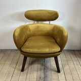 Mustard yellow velvet armchair from the 2010s.