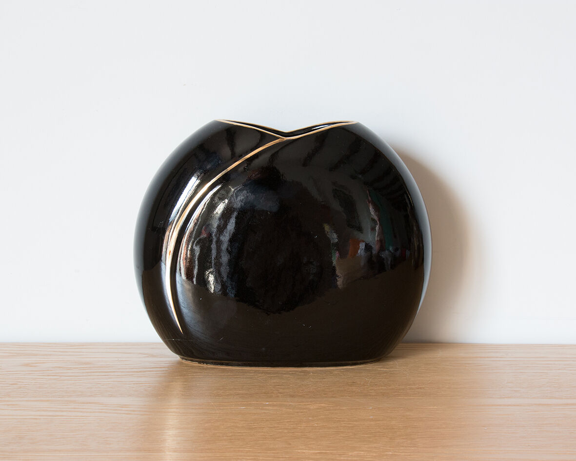 Black and gold vase