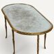 Maison Baguès coffee table in gilded bronze and aged mirror – 1950s