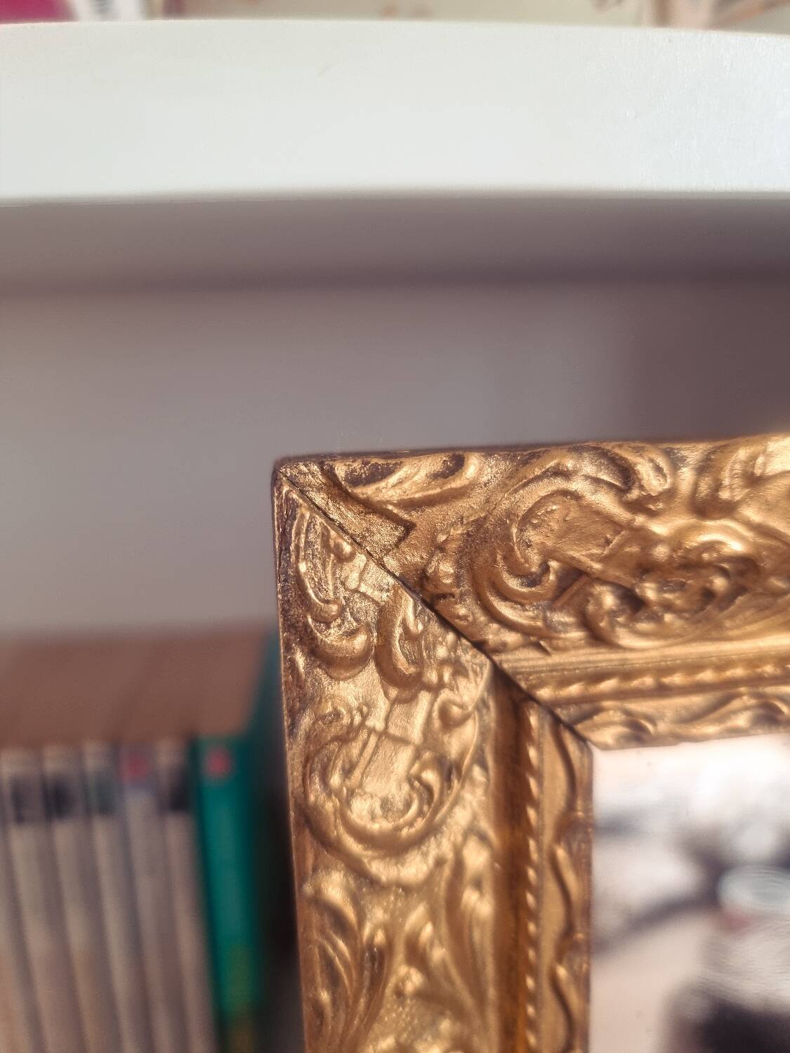 Mirror in wood and gilded stucco