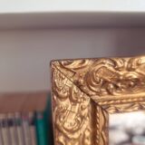 Mirror in wood and gilded stucco