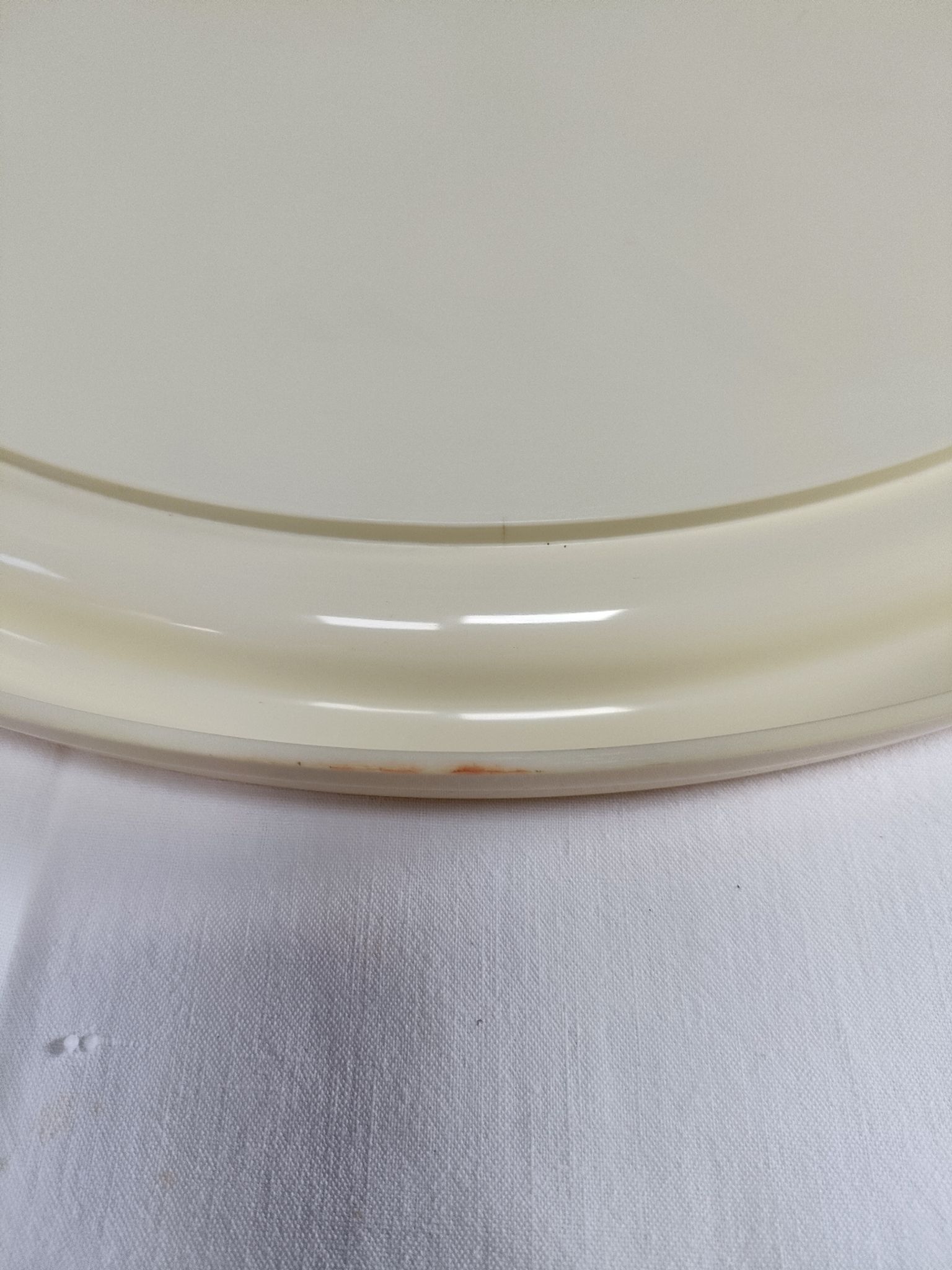 Round mirror in cream plastic, French house Syla, 70s