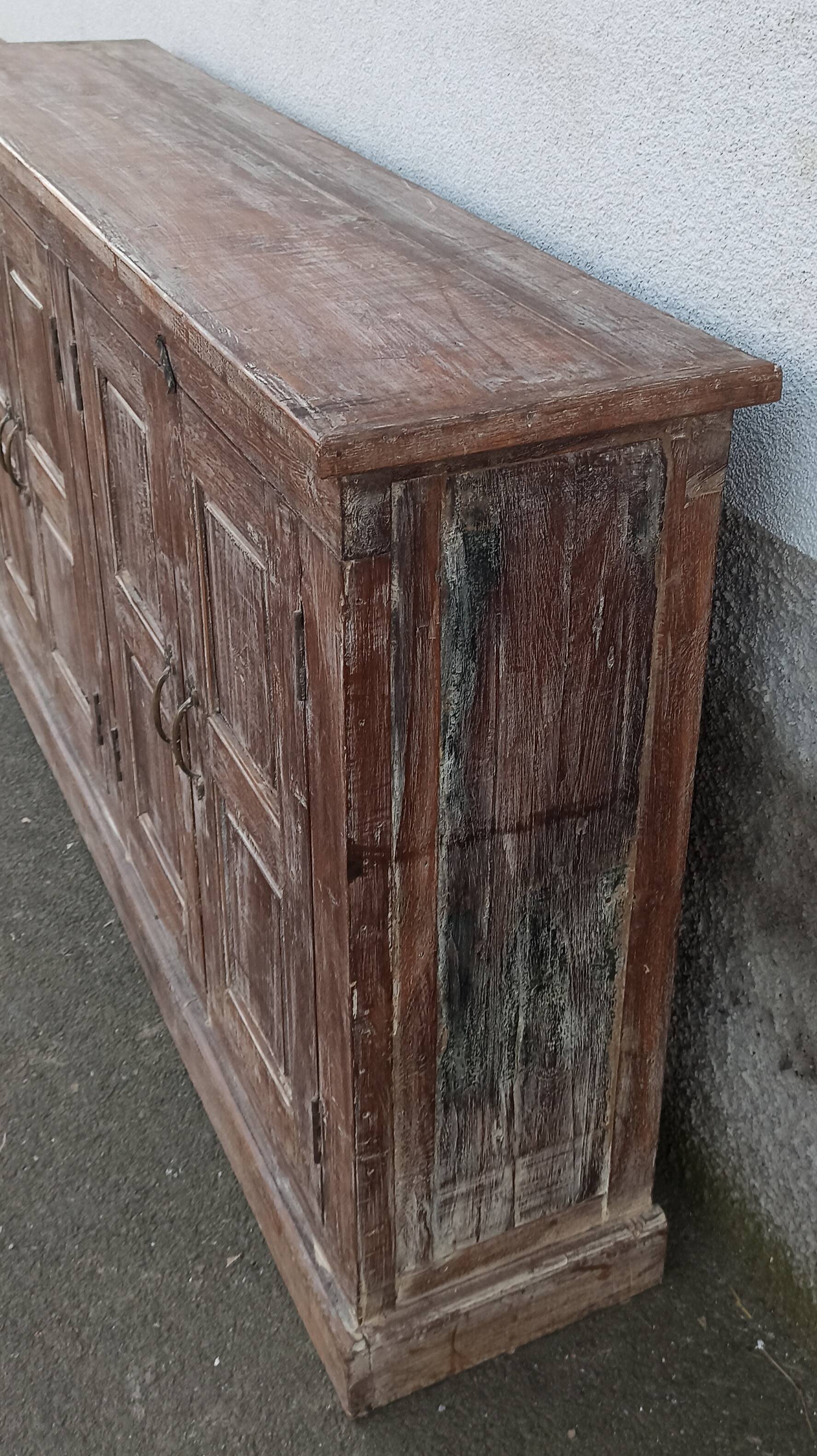 Old wooden sideboard with 4 doors