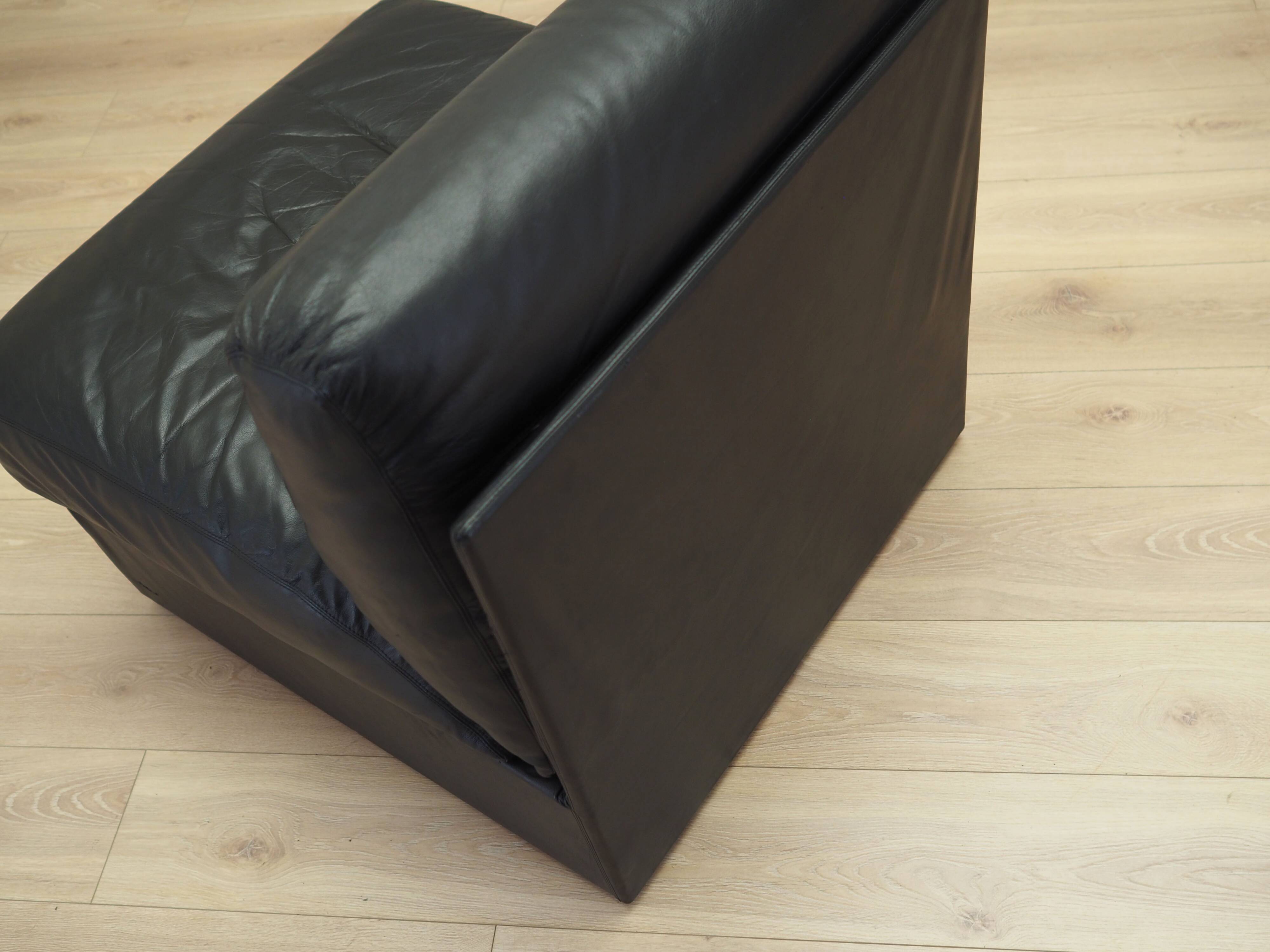 Black leather pouffe/armchair, Italian design, 1960s, production: Italy