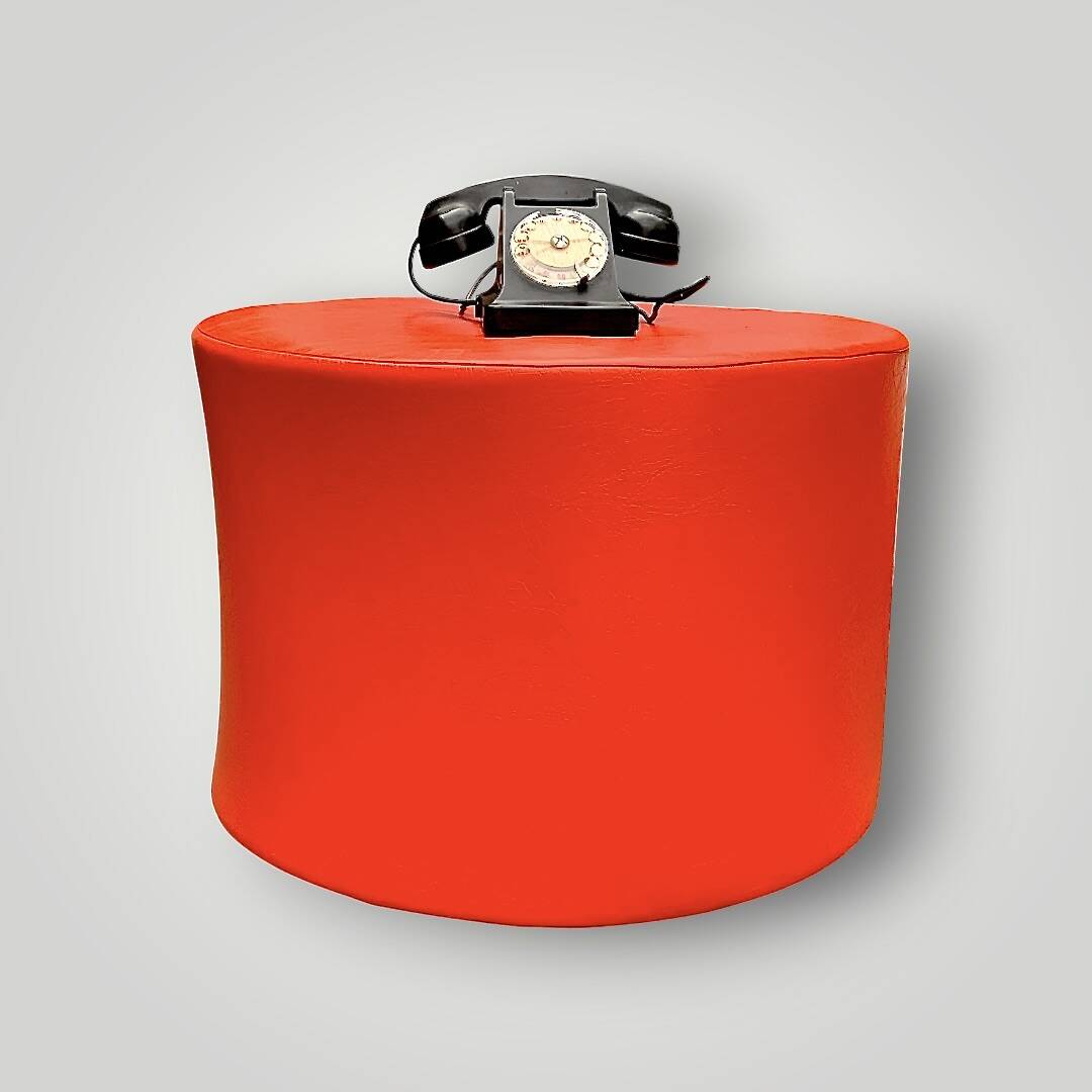 Large vintage pouf in red faux leather – diameter: 62 cm