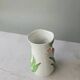 Vase in slipware with Arum flowers