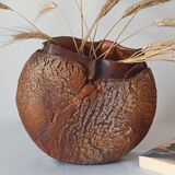 Signed textured terracotta vase