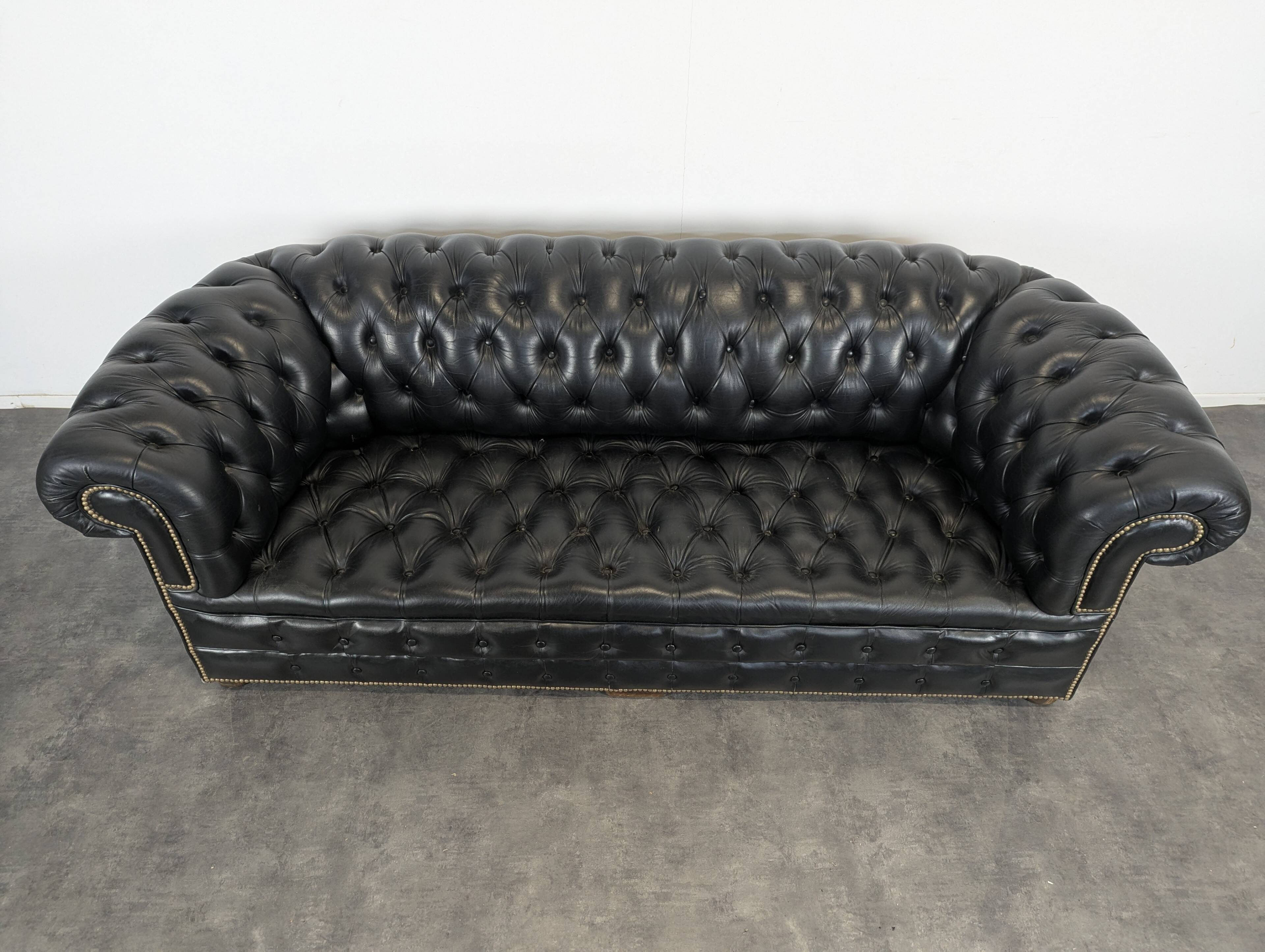 Black Chesterfield sofa for 4 people