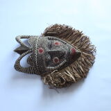 African mask with raffia and kaolin dots