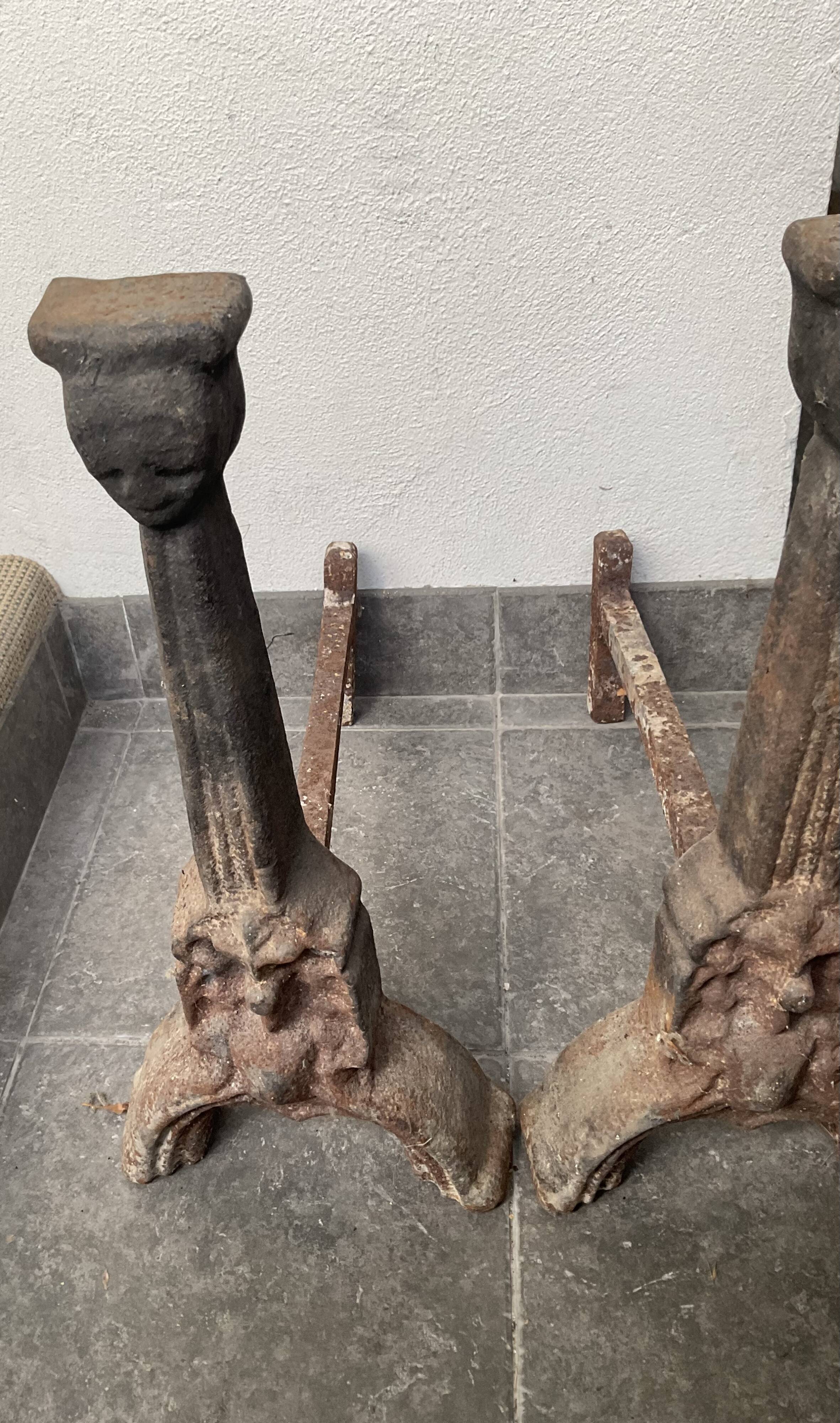 Pair of andirons from the high period with Gothic female heads.