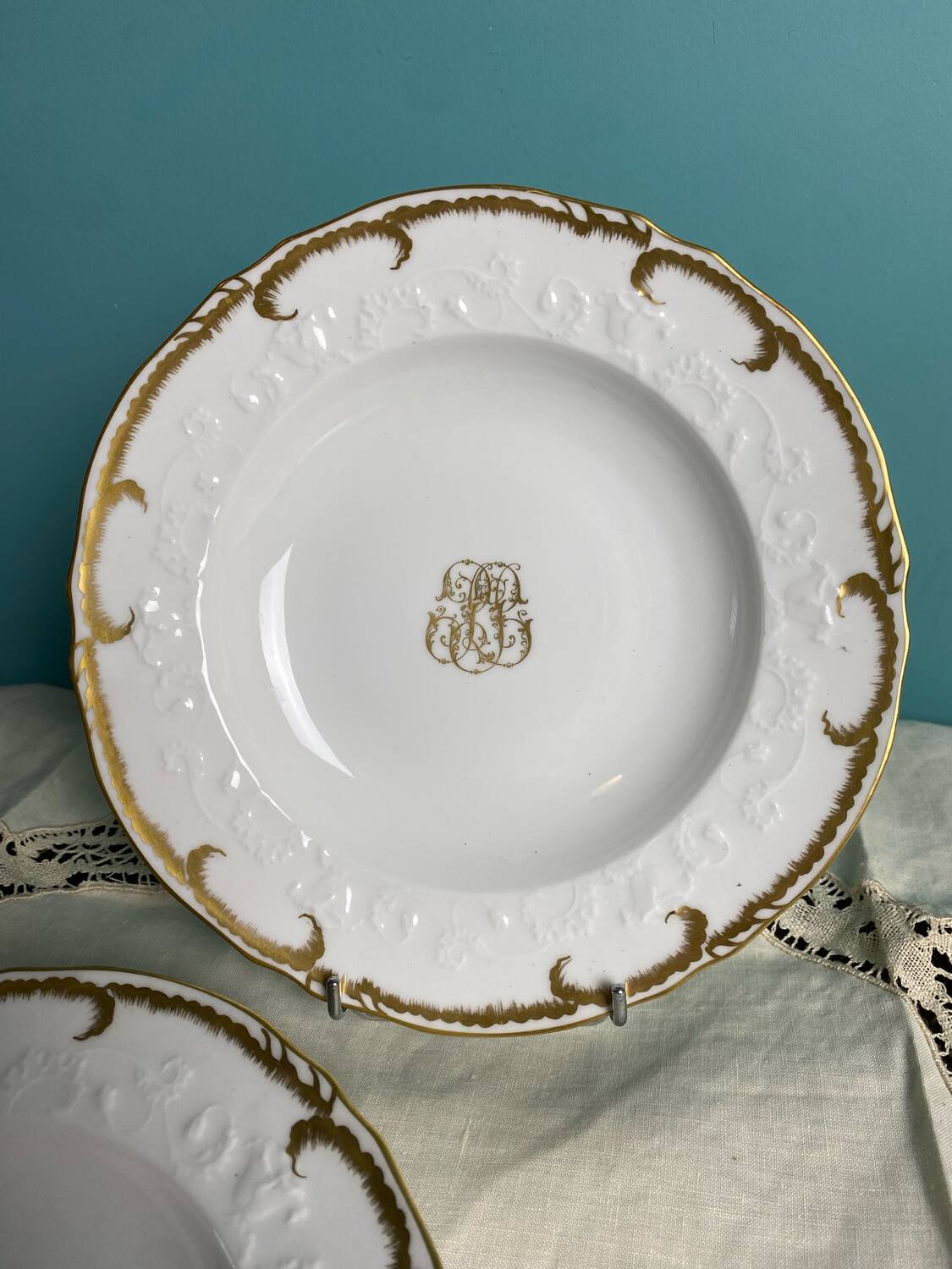 4 deep plates from Limoges with the PJC gold monogram.