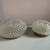 Pair of large and small round sconces in cut glass with ceramic support for the bulb