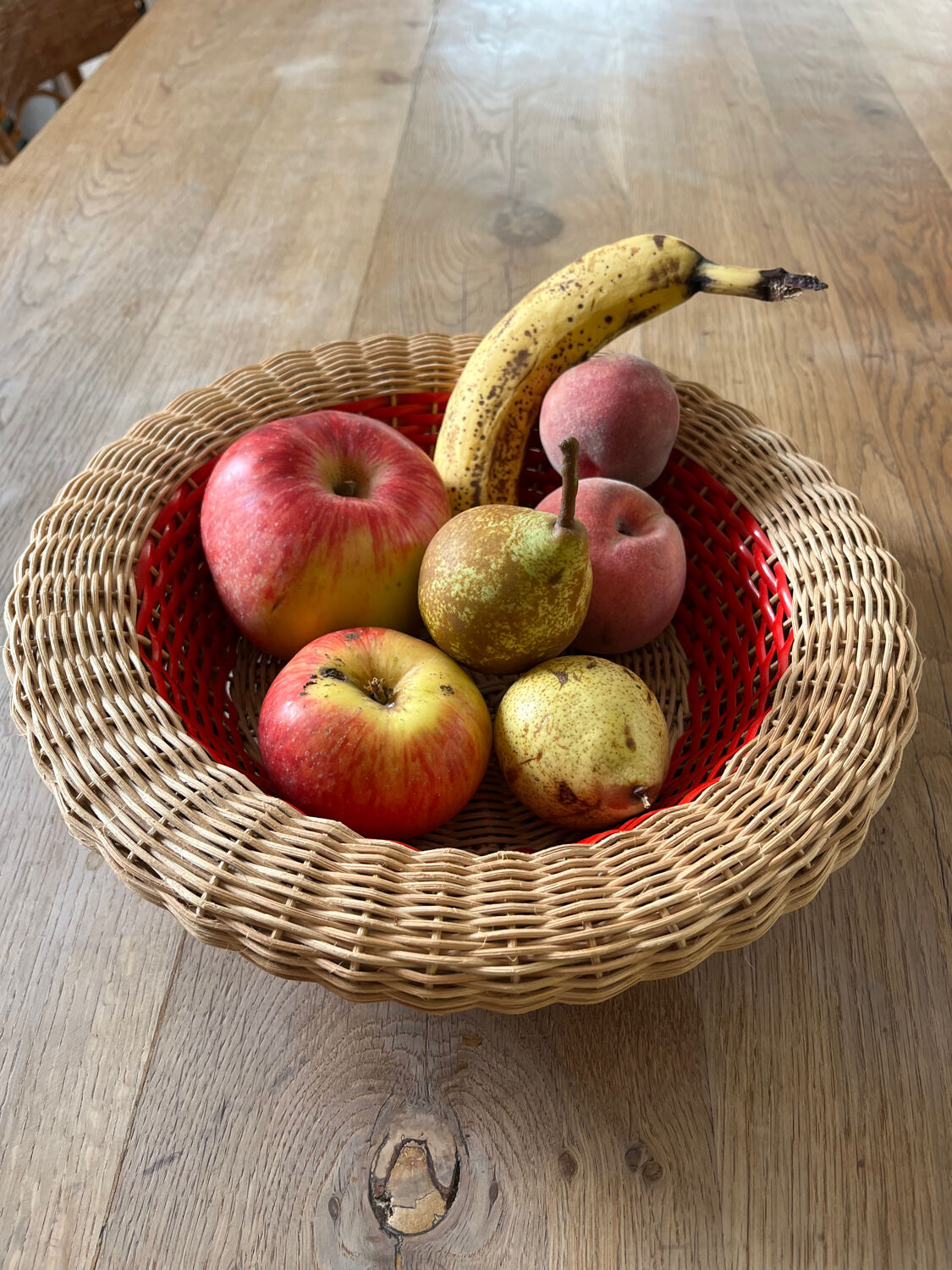Rattan basket with red trim