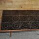 Brown rosewood coffee table with ceramic tile top - Denmark, 1960s