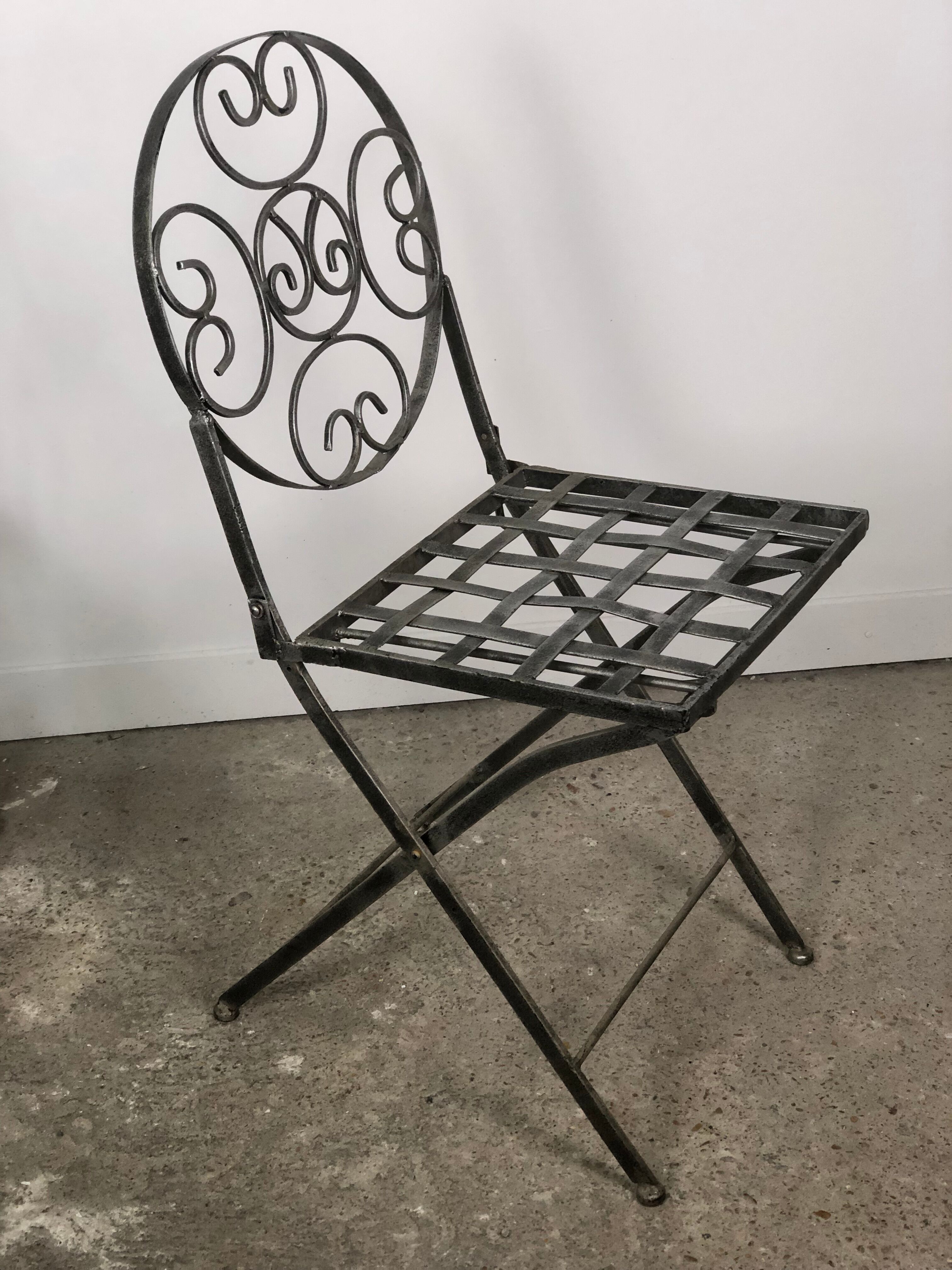 Garden chairs and armchairs (series of 4) vintage 1980 in wrought iron