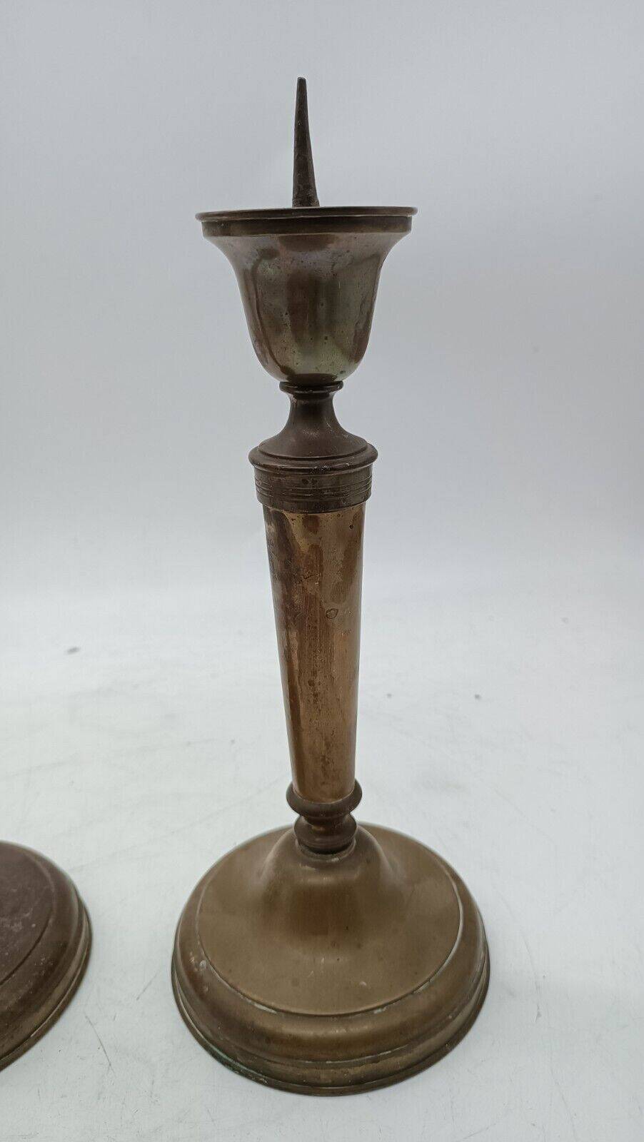 Pair of antique bronze candelabras