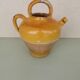 Yellow stoneware jug