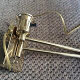 Wall lamp in gold metal