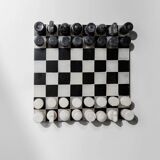 Vintage black-and-white marble chessboard with matching marble pieces, Italian 1960s design, sculptural centerpiece