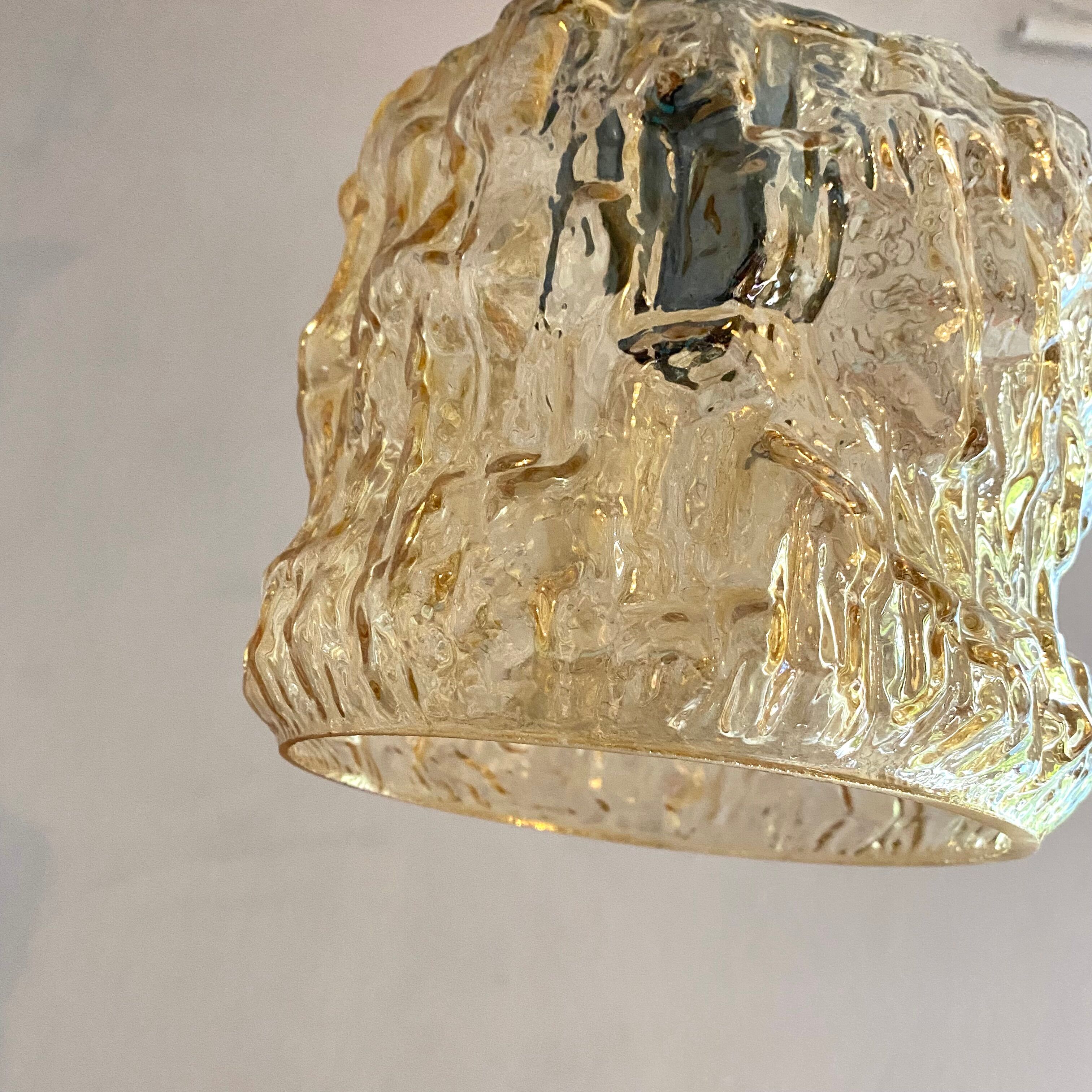 Pair of vintage amber glass pendant lamps