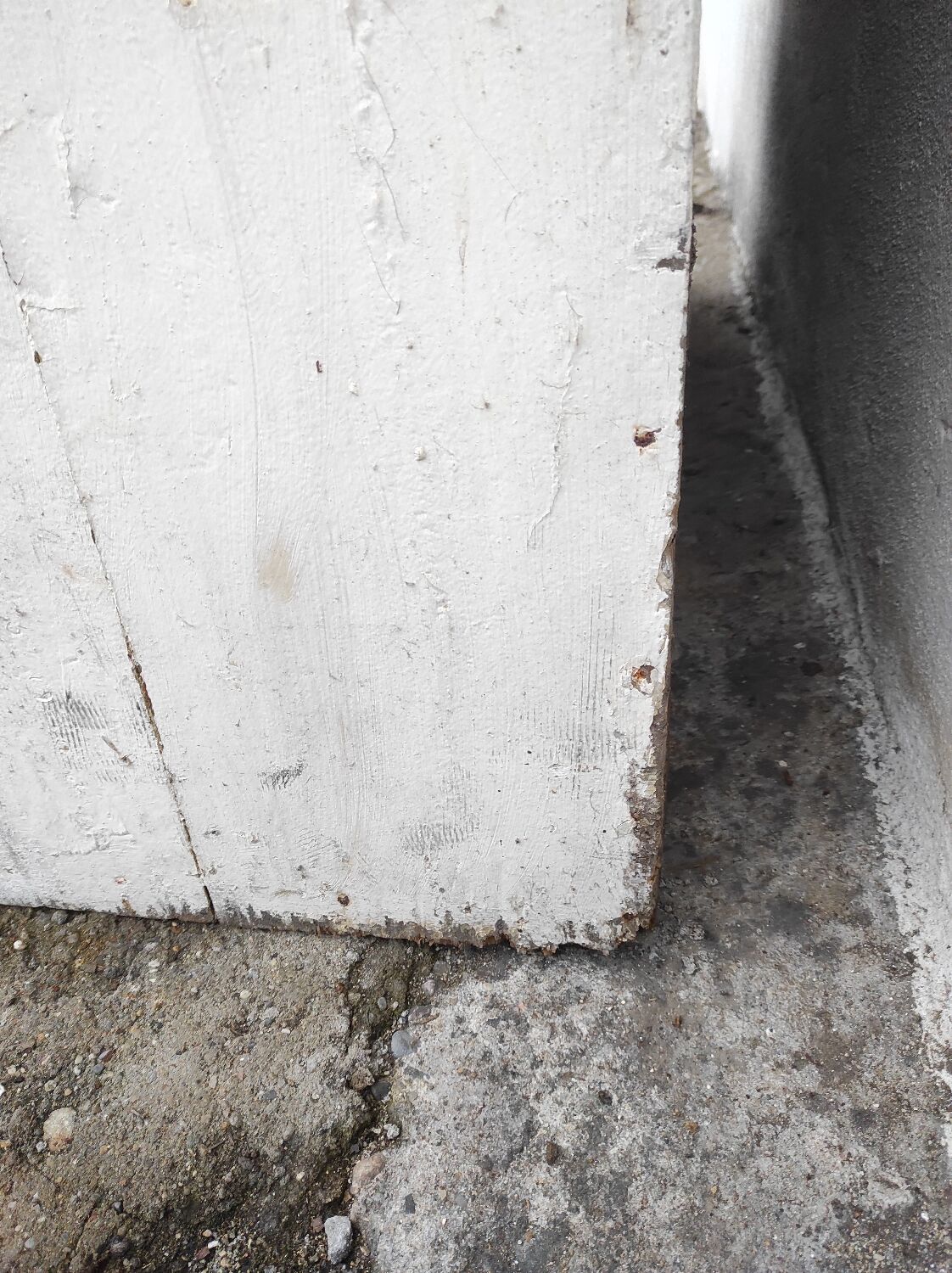 Old rustic Parisian wardrobe patinated white in oak and fir