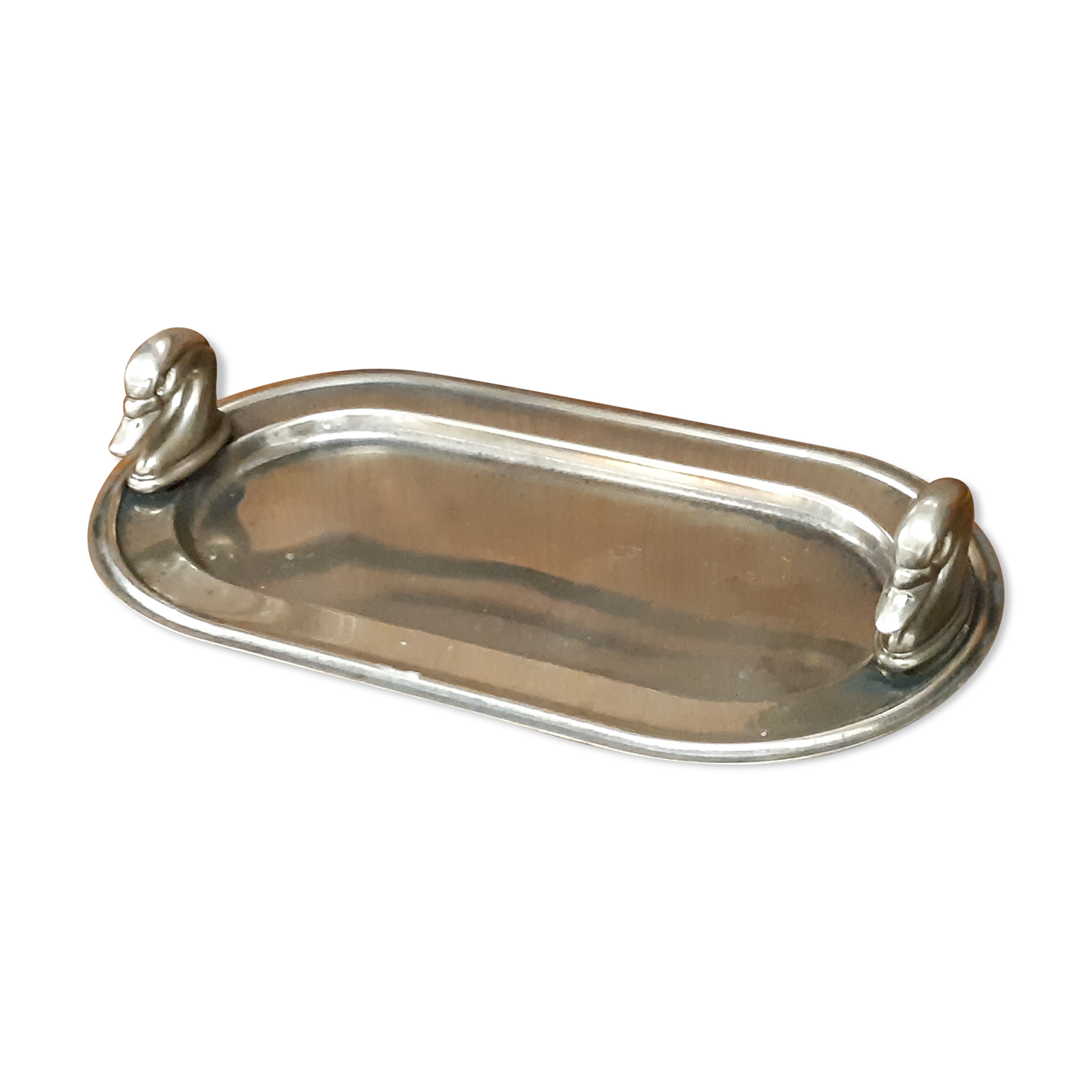 Silver dish with foie gras, duck heads