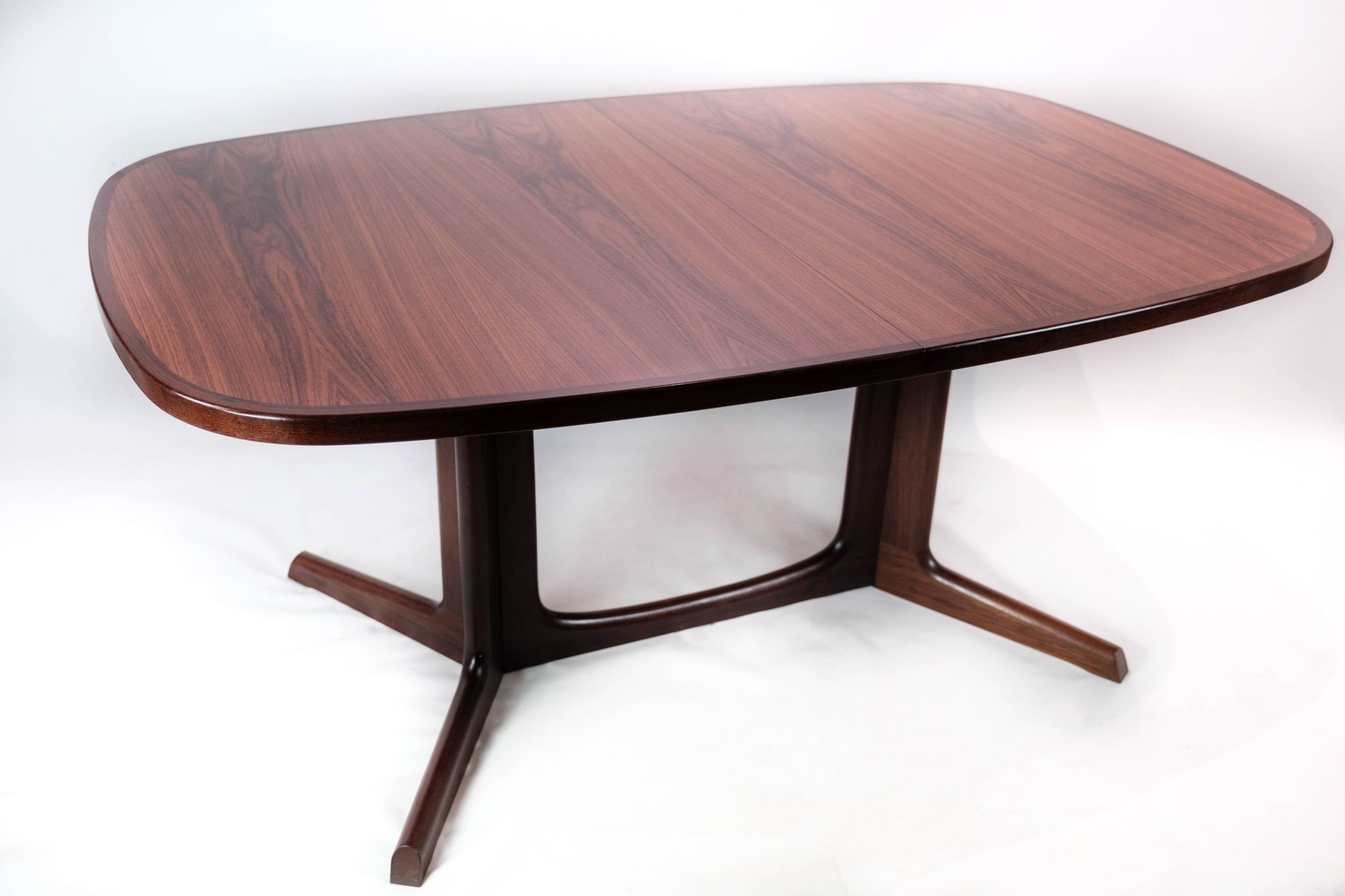Dining table in rosewood with extensions of Danish design by Gudme Furniture, 1960s