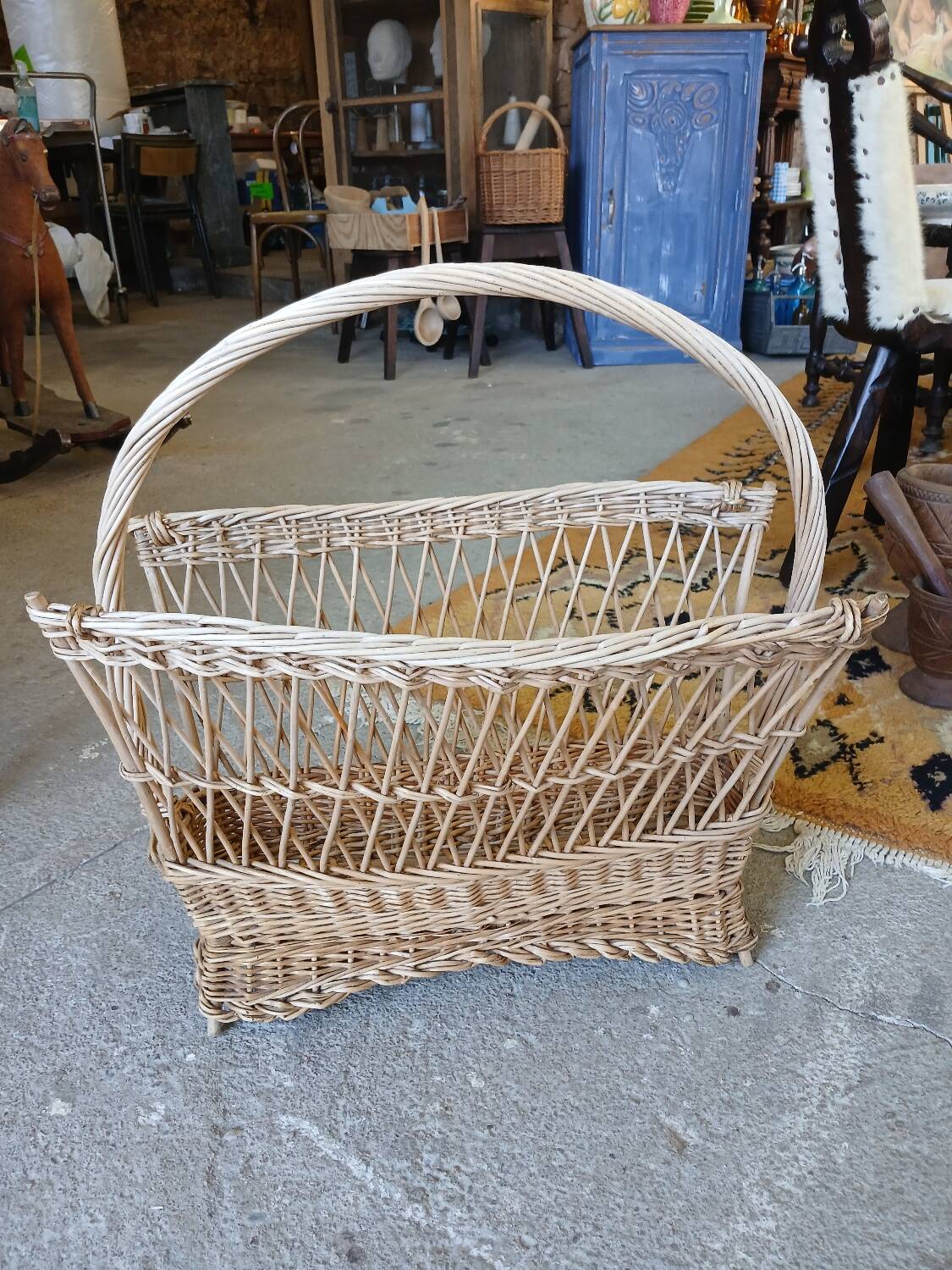 Antique wicker magazine rack