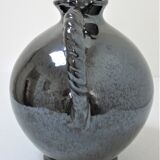 Black pearl glaze ceramic pitcher by Reinhold Rieckmann signed