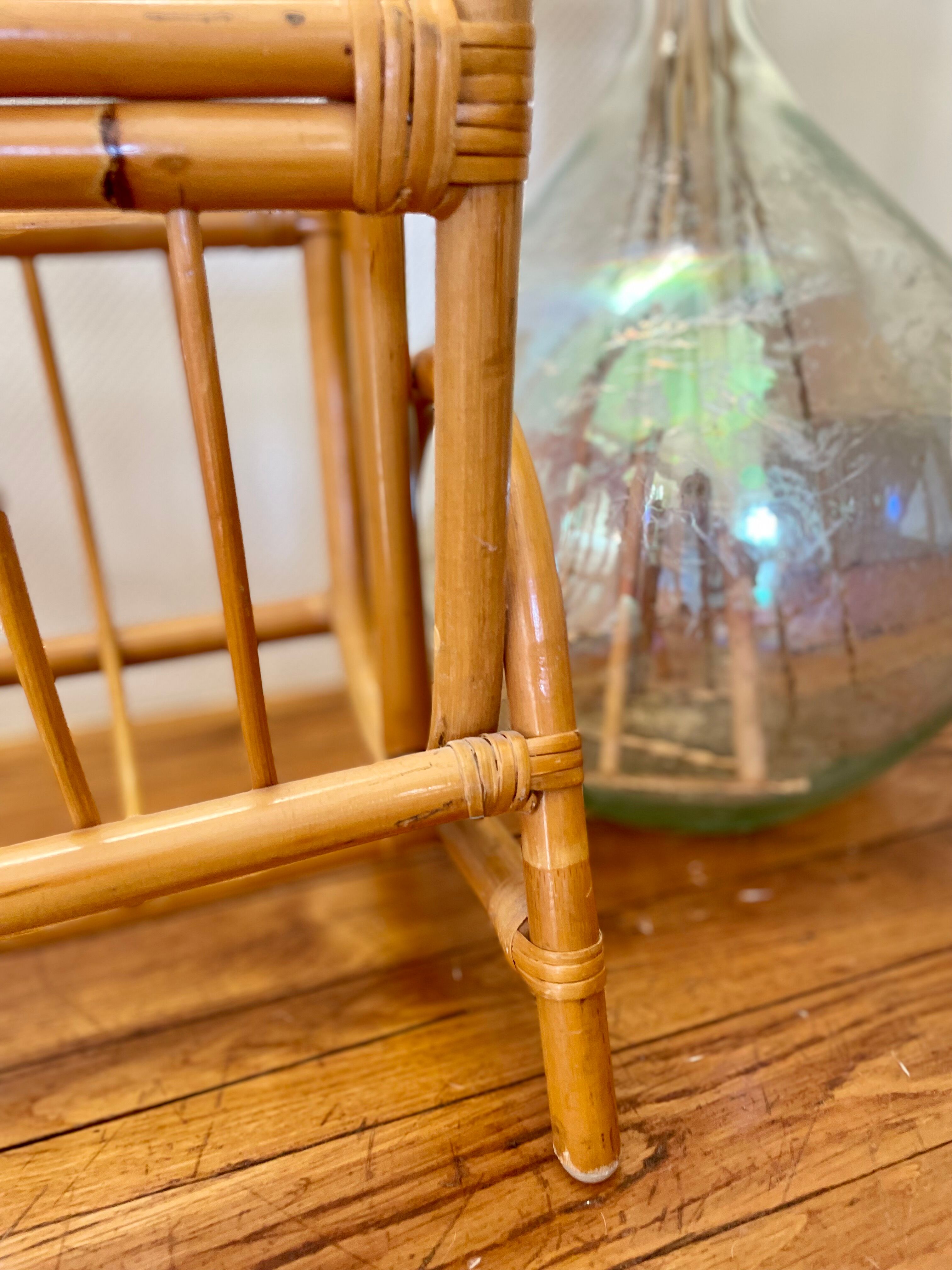 Vintage rattan magazine holder from the 60s and 70s