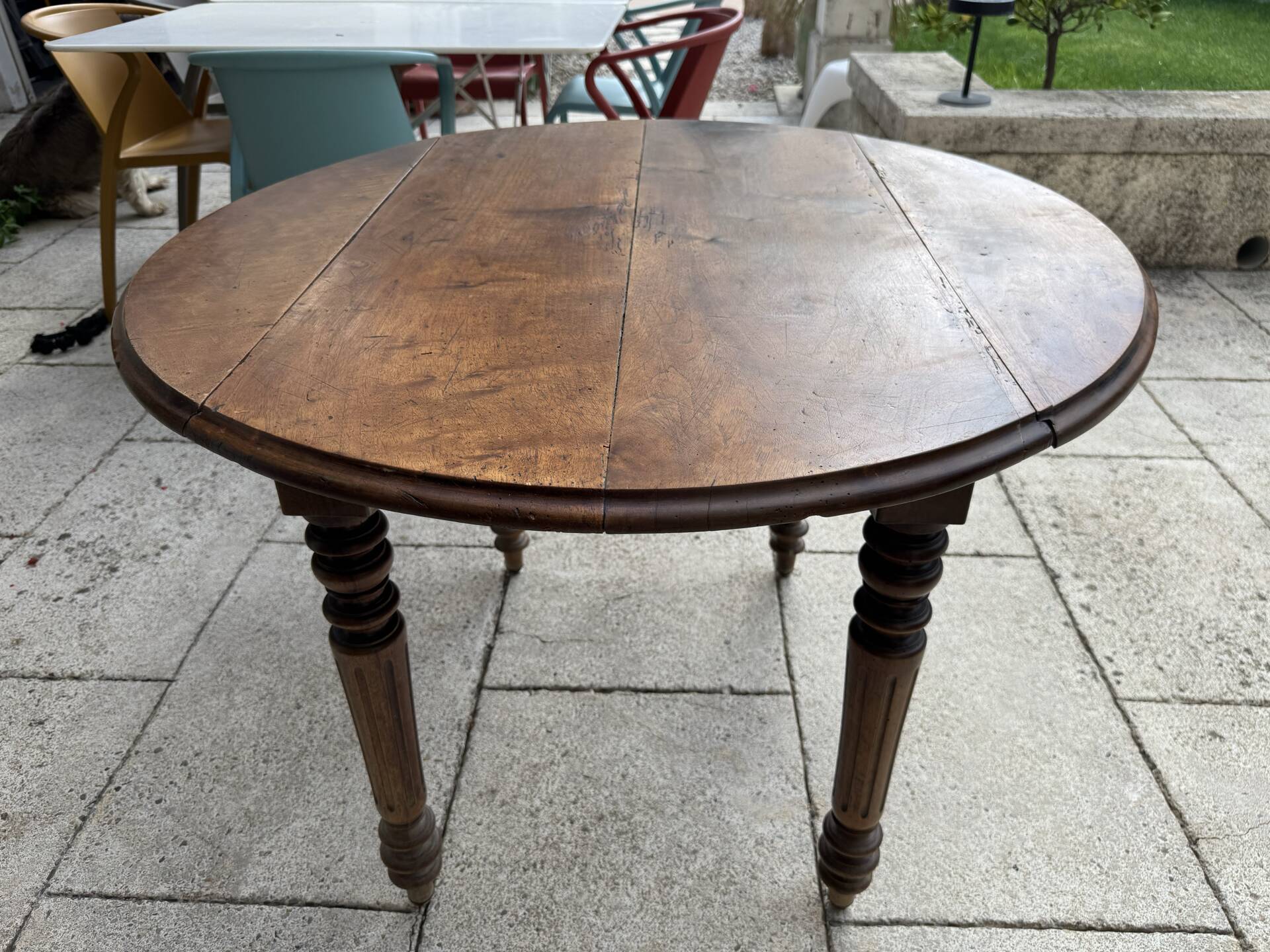 Farm table, two drop-leaves, 19th century, solid walnut.