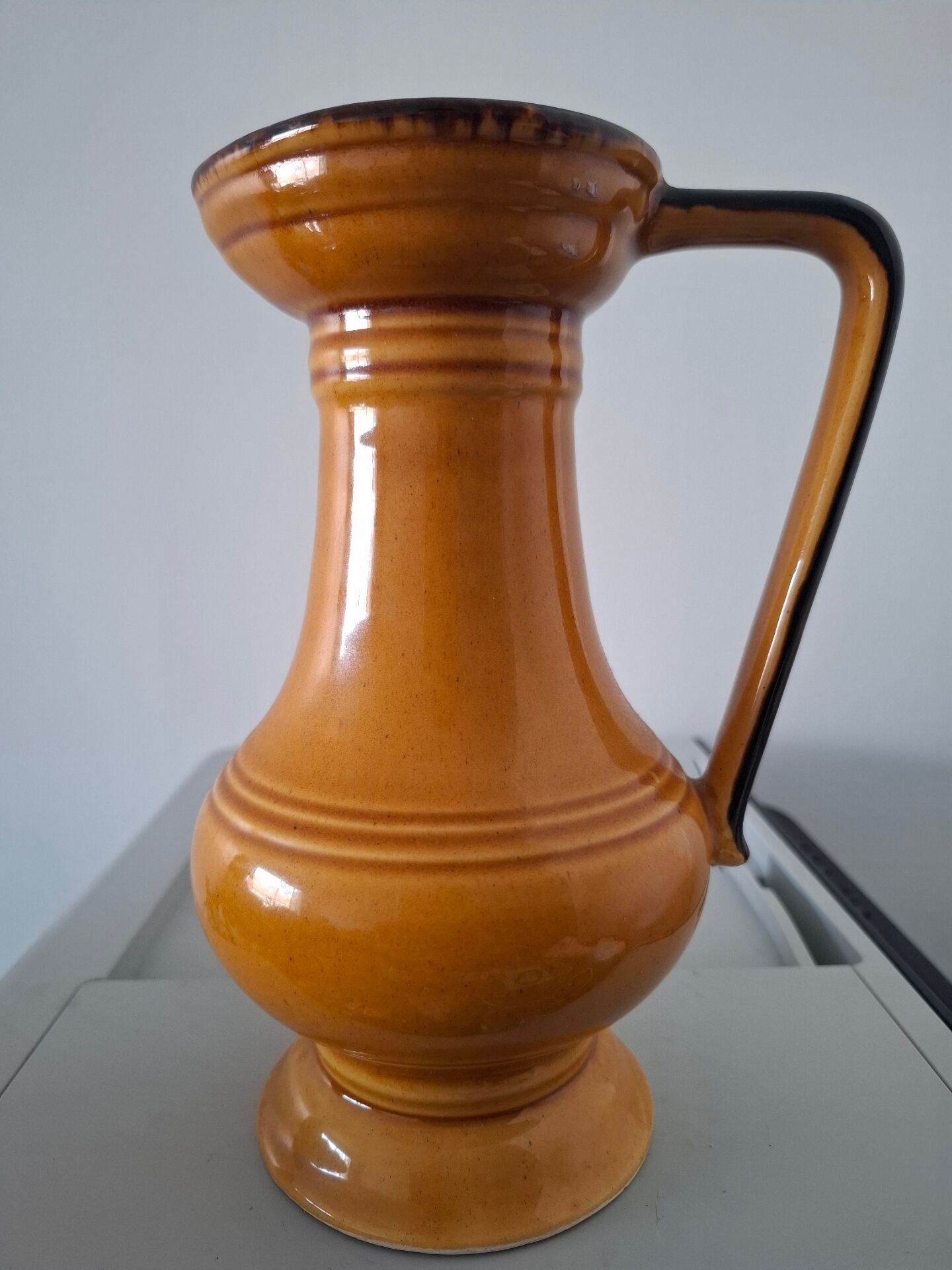 Old ceramic pitcher signed Angèle