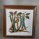 Dessous de plat ancien avec motif botanique