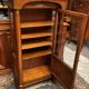 Empire style display case in cherry wood