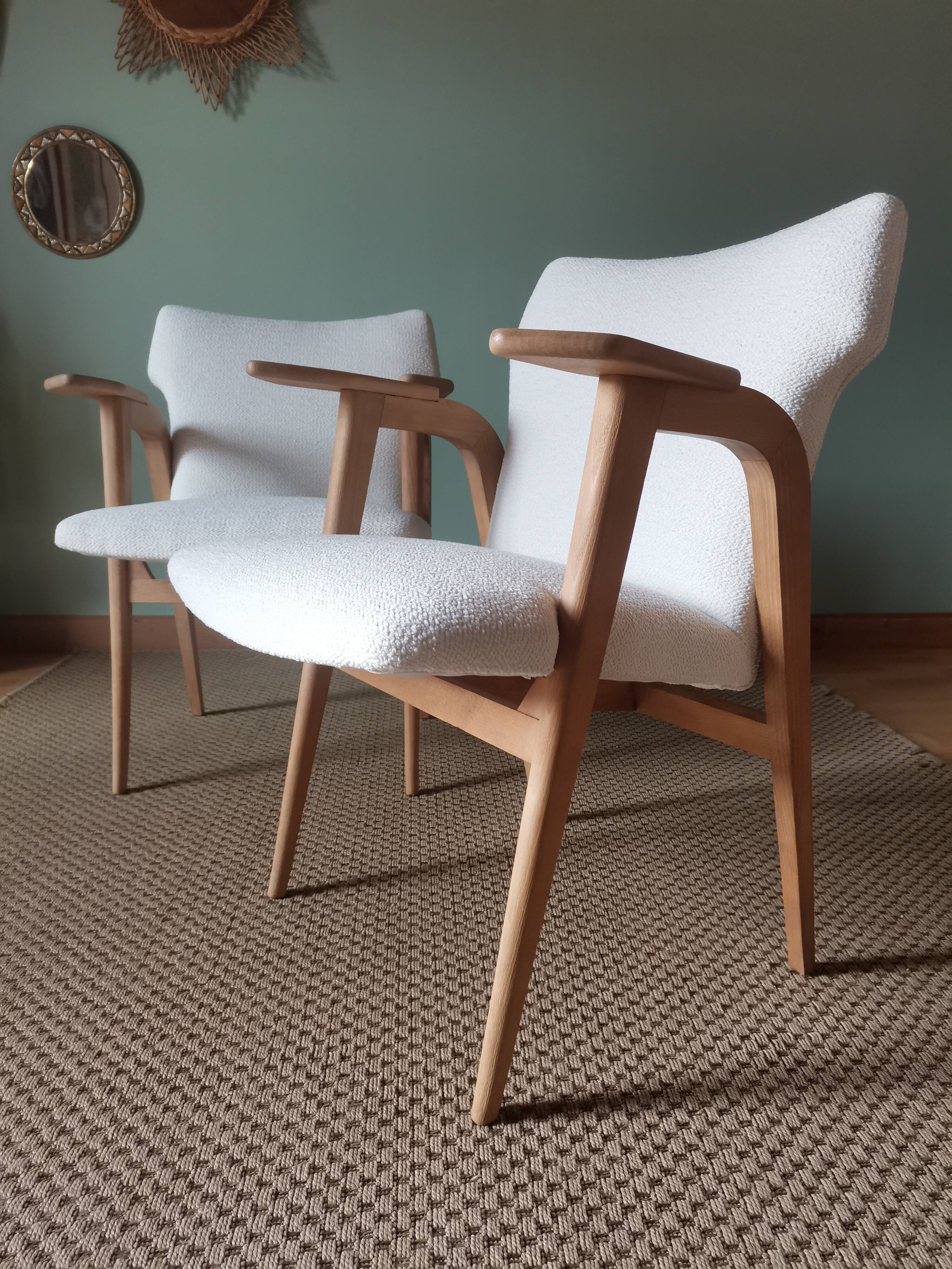 Scandinavian armchairs by Roger Landault in white.
