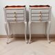 Pair of antique bedside tables