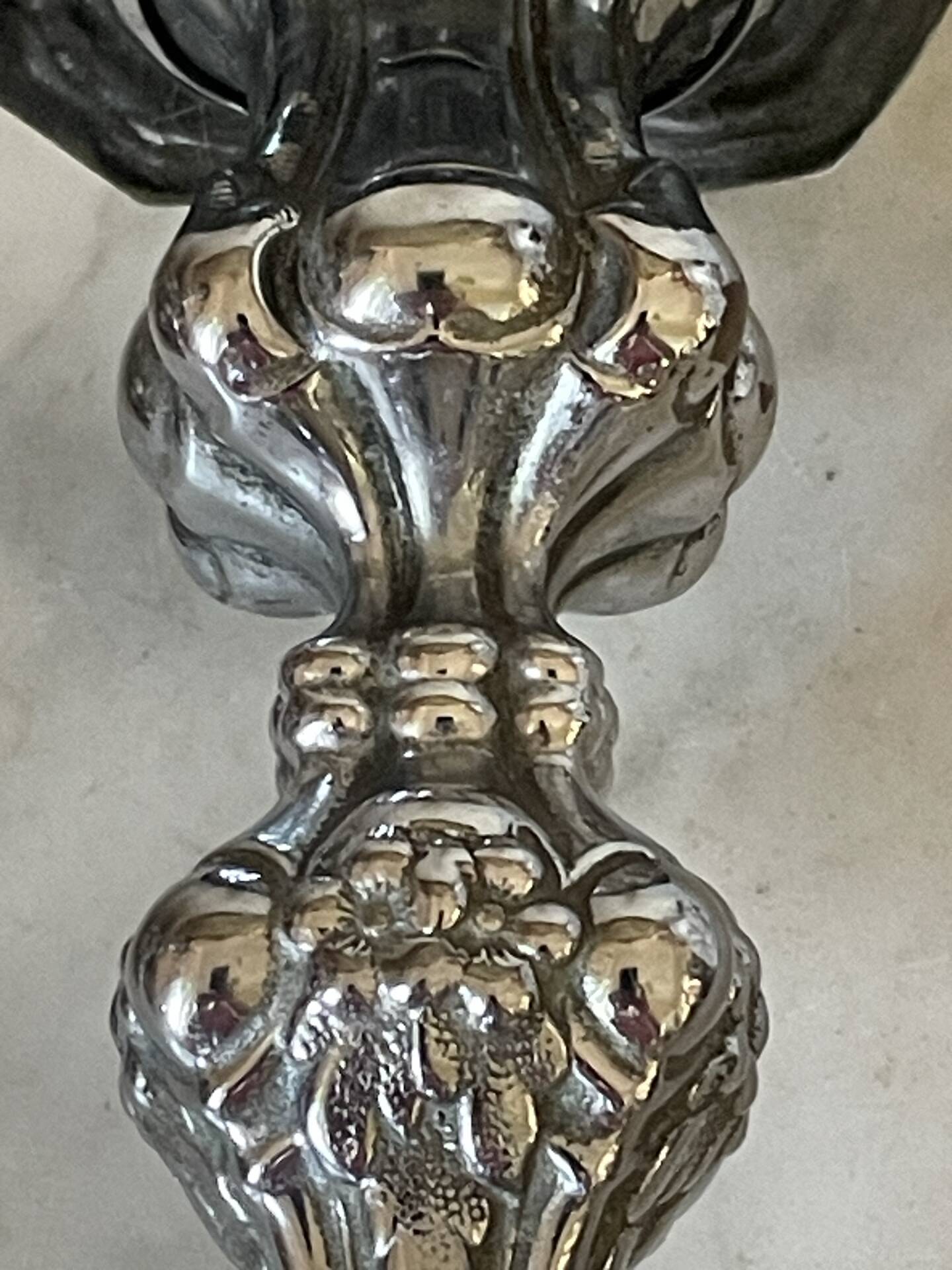 Pair of rococo silver-plated candlesticks