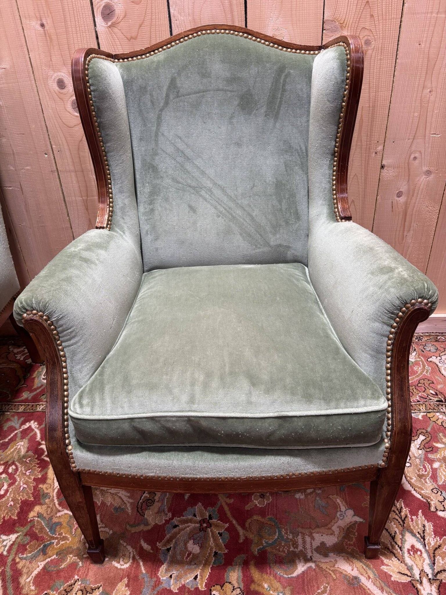Pair of Louis XVI style wingback armchairs