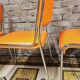 Set de 4 chaises chromées skaï orange 1970 vintage