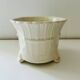 Tripod basket cache pot