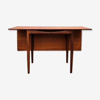 Dining table by Ib Kofod Larsen of the 60s