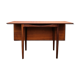 Dining table by Ib Kofod Larsen of the 60s
