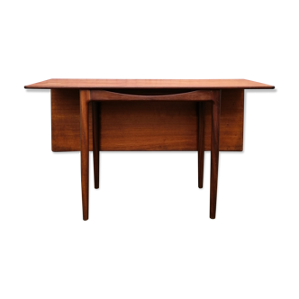 Dining table by Ib Kofod Larsen of the 60s