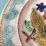 Old barbotine dessert plate. Floral patterns