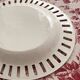 Dish in fine old earthenware, braided and openwork