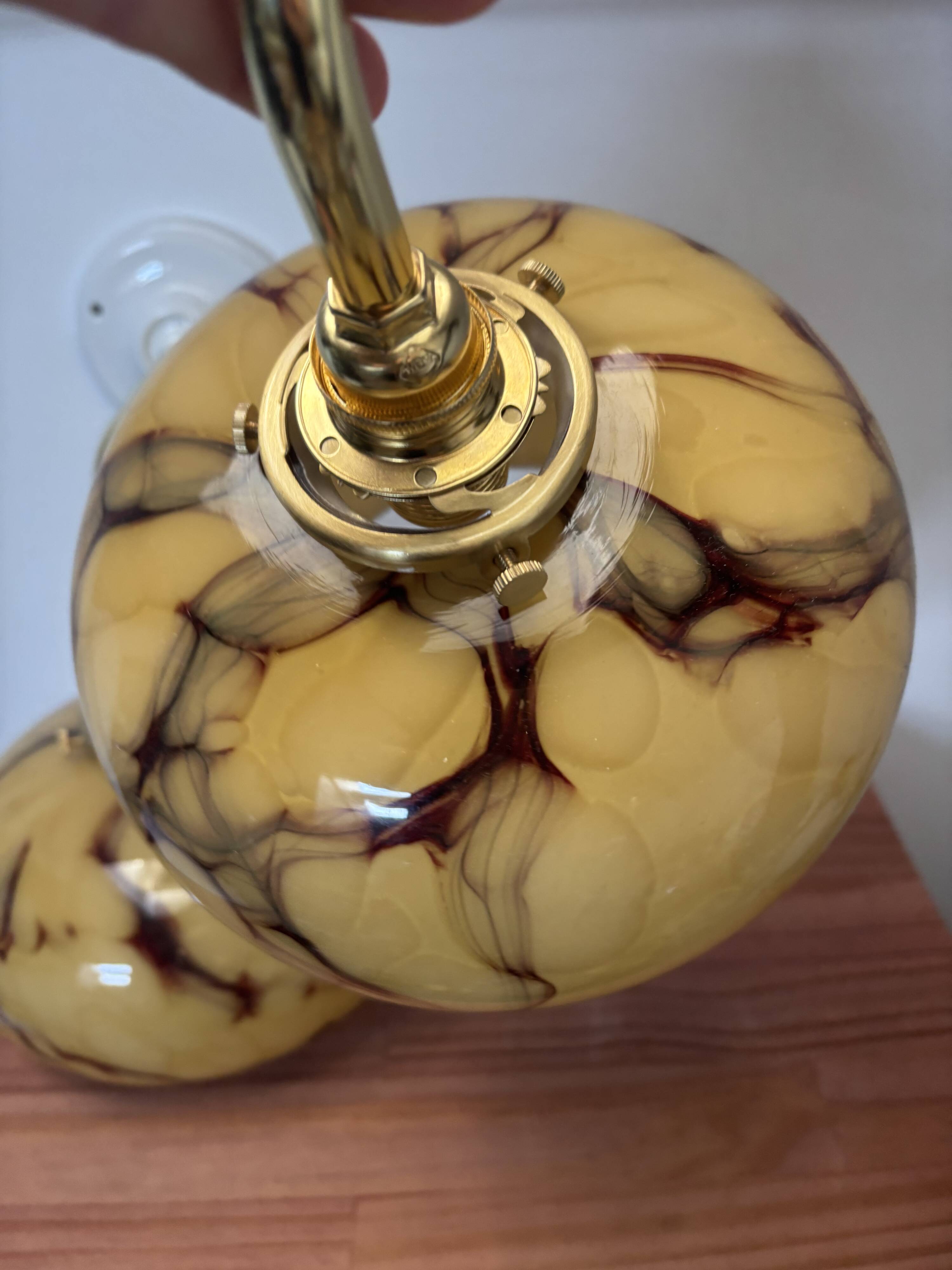 Pair of Art Deco wall sconces in marbled opaline